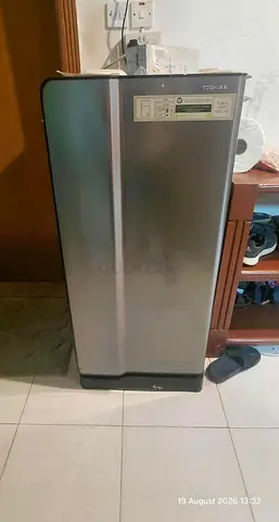 Used Toshiba  Refrigerator - good condition, stainless finish