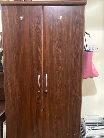 Two-door wooden wardrobe with lock - good condition