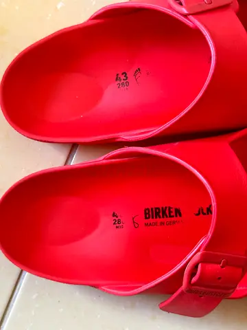Red Birkenstock-style EVA sandals, size EU 43 (men's 9-10)