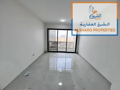 First-occupancy 1BR with master bedroom, balcony, central gas & AC, spacious layout, prime location, and easy access to Sharjah & Dubai.