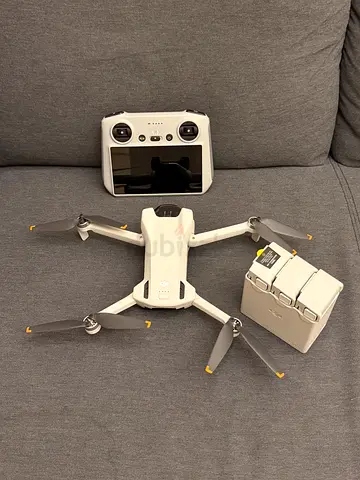 Used consumer quadcopter drone with controller and spare battery