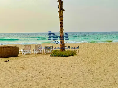 Own A Freehold & Luxuriously Renovated 2BHK+Maid’s With Private Beach!