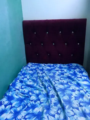 Bed with headboard
