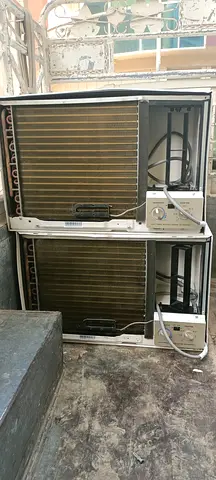 Two used window air conditioner units - for parts or repair