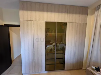 High-End Modern Wood-Finish Wardrobe with Glass Center Doors