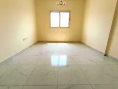 NEW MUWAILEH LIKE NEW 1 BHK 2 BATH WARDROBES BUILT IN WITH CENTRAL AC FREE PARKING FOR FAMILY ONLY