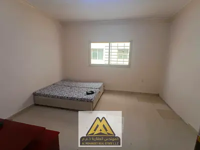 1BR apartment + separate living room in Al Nuaimiya 2, Ajman. 1 bath, balcony, built-in wardrobes &