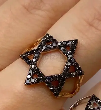 Gold-tone Star of David ring with black stones - women's ring