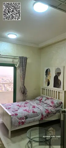 Elegant fully furnished studio for annual rent in Al Alia. Excellent space, bathroom, balcony, 4 payments, family-friendly, and close to all services.