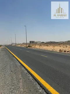 Residential land for sale in Al Matraq area, Sharjah, at the lowest prices.