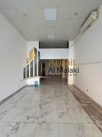 Prime commercial shop for rent in Al Qasimia, offering a strategic location ideal for various busin