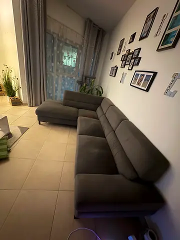 L-shaped grey fabric sectional sofa - good condition