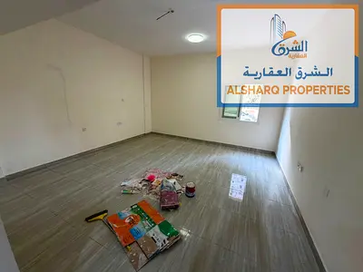 Large ground-floor studio on Ajman Corniche, bright, spacious, central AC, prime location, easy acc
