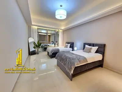 Luxurious and elegant fully furnished two-bedroom apartment with a living room, gym, swimming pool, and private parking.