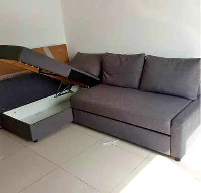 Grey L-Shaped Sofa Bed with Integrated Storage
