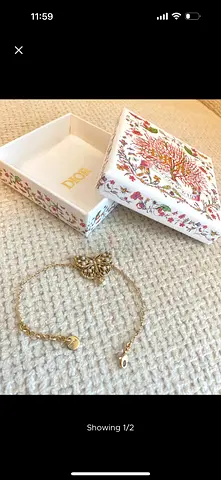 Gold-tone heart pendant bracelet with Dior box