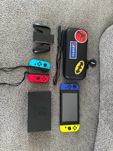 Nintendo Switch with Dock, Joy-Cons, Grip and Carry Case - Good Working Condition