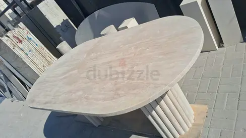 Solid stone dining table with column-style base - good condition