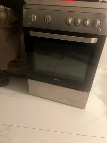 Used freestanding gas oven and stove, stainless steel