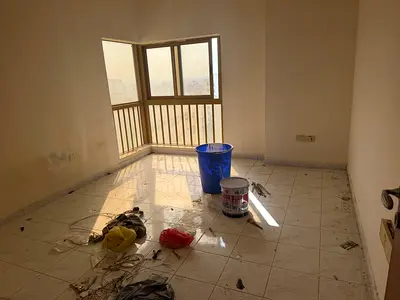 READY TO MOVE 🏠 1 BHK | Bathrooms | Closed Hall | Central AC | | AED 26,000 – Sharjah