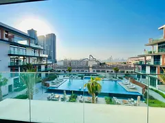 Furnished 1BR Apartment | Oxford 212 JVC | Balcony & Pool Access