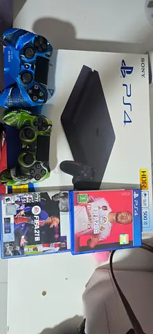 Sony PS4 Slim with 2 DualShock Controllers + FIFA 20 & FIFA 21