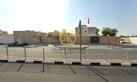 For sale in Al Ghafiya, Sharjah: corner property on a main street, in a lively area close to all se