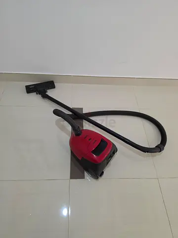 Used canister vacuum cleaner - good working condition