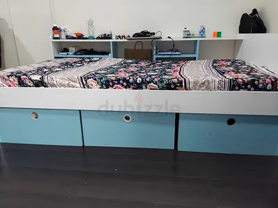 Single bed with built-in storage drawers - light blue & white