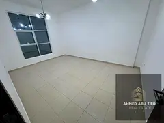 A distinctive two-bedroom apartment with a large living room, a closed kitchen equipped with electri