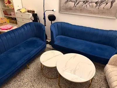 Pair of Blue Velvet Curved Sofas with Marble Nesting Coffee Tables