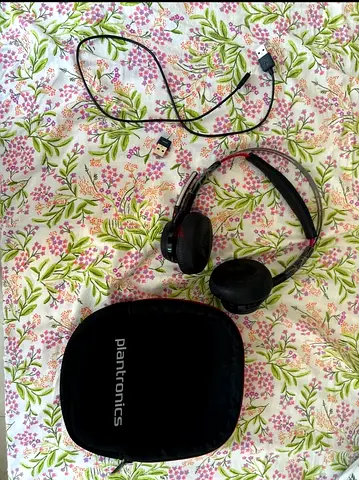 Plantronics Bluetooth On ear headset with carry case and charger