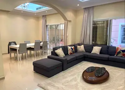Large L-shaped Grey Fabric Sofa with Ottoman - Good Condition