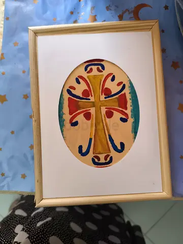 Hand-painted framed decorative cross artwork (oval mat)