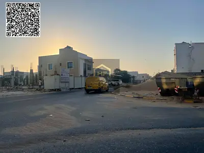 أرض سكنية للبيع في الزاهية عجمان - تملك حر وعلى شارع قار