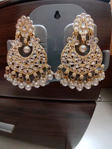 Gold-tone chandelier earrings with pearl drops — traditional jhumka style