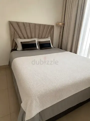 Storage bed with upholstered headboard in excellent condition