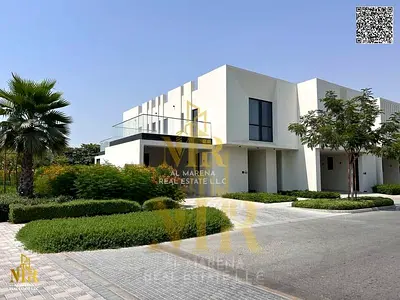 Corner villa in Al Zorah | 6200 sq ft | Partial lake and golf course view | Two floors | 3 bedrooms | Large garden, swimming pool, and barbecue area |