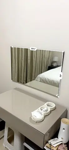 Wall-mounted rectangular mirror — modern, good condition