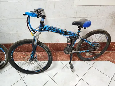 Blue full-size mountain bike - used, good working condition