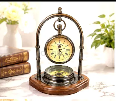 Majestic vintage table clock with compass from london for sale.