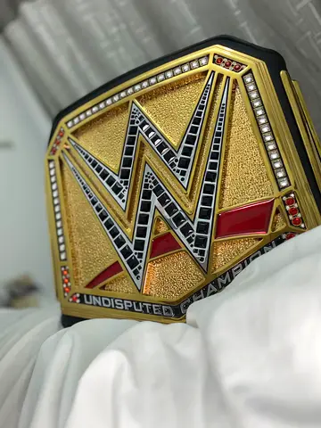 WWE Undisputed Championship Replica Belt - Collectible Display Piece it is signed by Roman Reigns