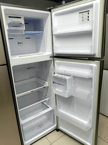 Used top-freezer refrigerator - clean interior, working condition