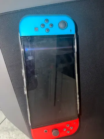 Nintendo Switch console with Joy-Cons (blue/red) - used