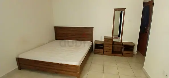Wooden double bed with mattress + dressing table and bedside drawers