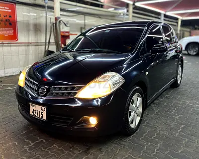 Well-Maintained 2009 Nissan Tiida Hatchback (GCC Specs) – Great Fuel Economy & Chilling A/C!