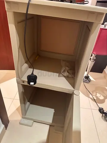 Small beige bedside cabinet / nightstand with storage comes with lamp