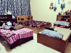 Furnished shared room for executive lady at shabiya 10