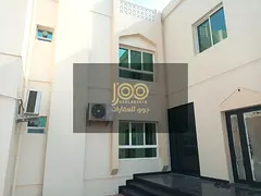 A spacious, distinctive two-story villa featuring a practical design, family-friendly spaces, and a
