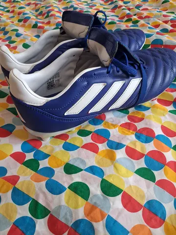 Blue Adidas football boots, size 42 — lightly used